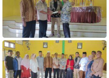 Asisten lll Pemkab Muna Mewakili Plt Bupati Muna Serahkan SK Plt Camat Lohia yang Purna Bakti